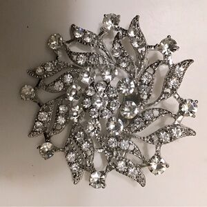 Silver rhinestone brooch